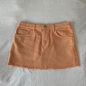 size 4 orange bershka mini denim skirt. mid-low rise